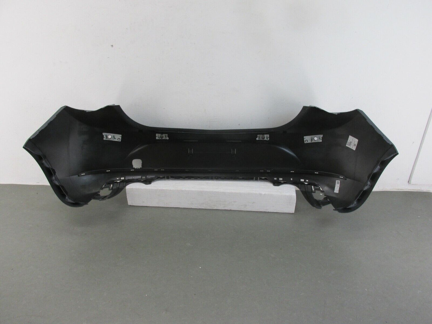 Neu original Opel Stoßstange hinten Stoßfänger Heckschürze 1404565199